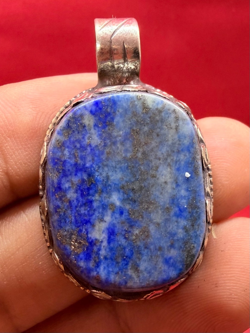 Beautiful large Oval-Shaped Lapis lazuli Gemstone Pendant Set In A Decorative
